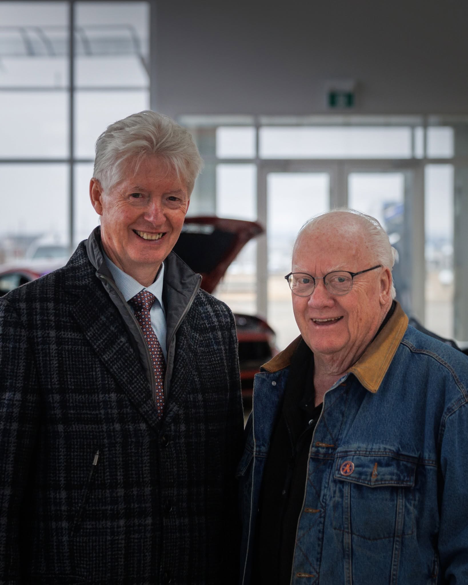 Two longtime Windsor Ford team members in the showroom