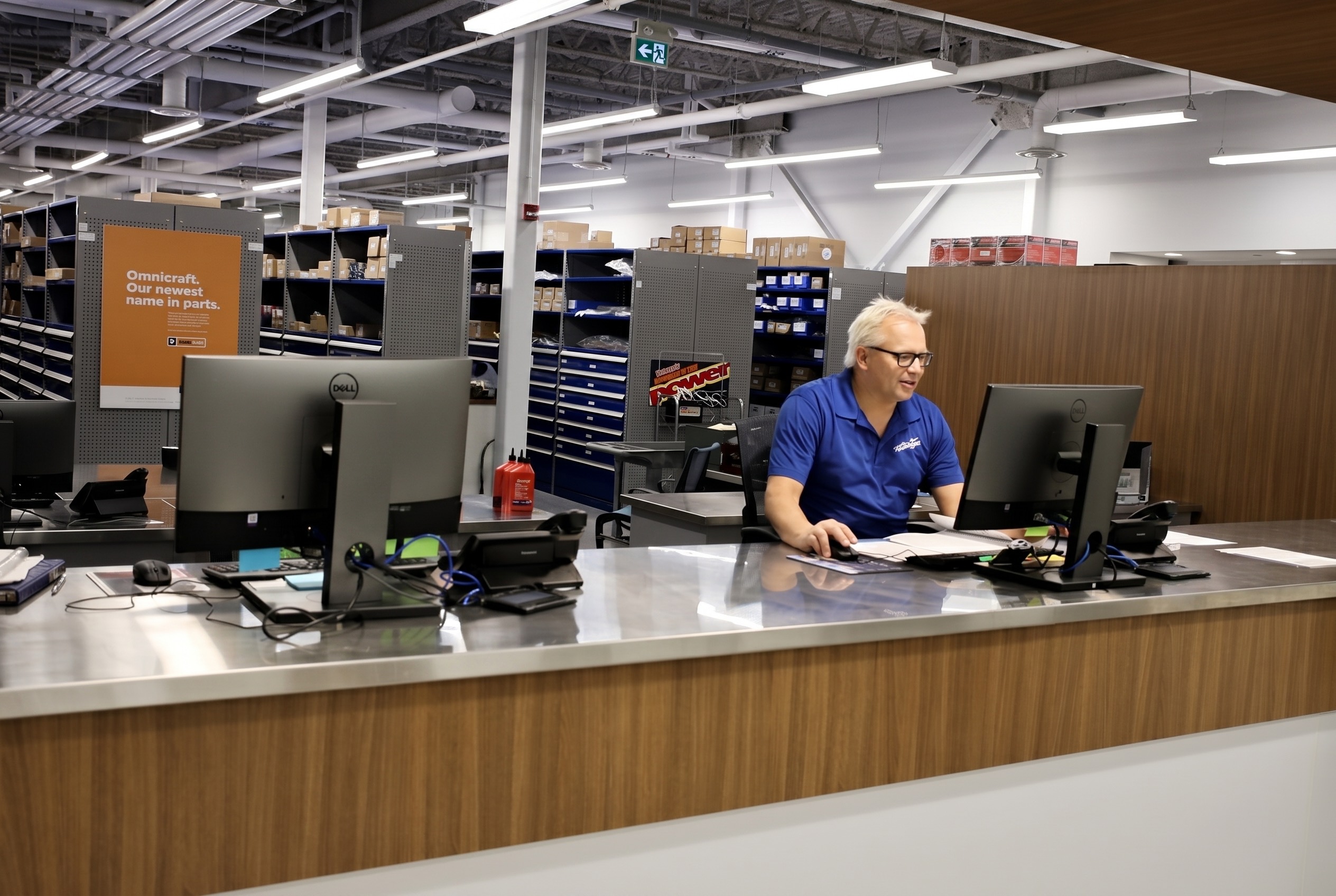 A Windsor Ford parts advisor at the parts counter