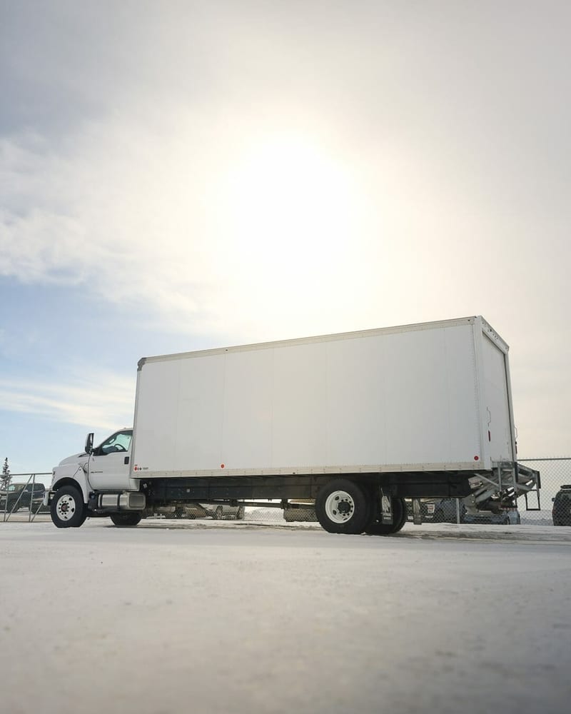 Ford F-750 box truck with a lift gate, parked at Windsor Ford