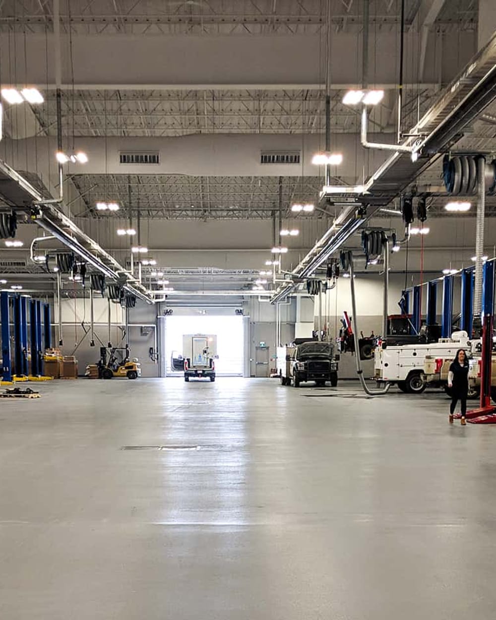 The Windsor Ford service shop floor, with work trucks and service bodies in the bays