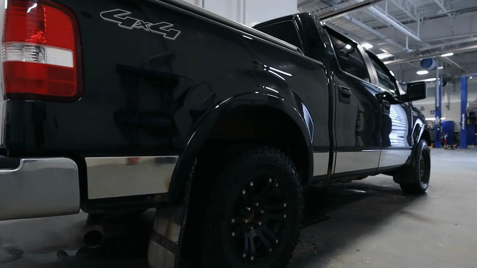 A freshly detailed black Ford F-150 in the Windsor Ford detail bay in Grande Prairie