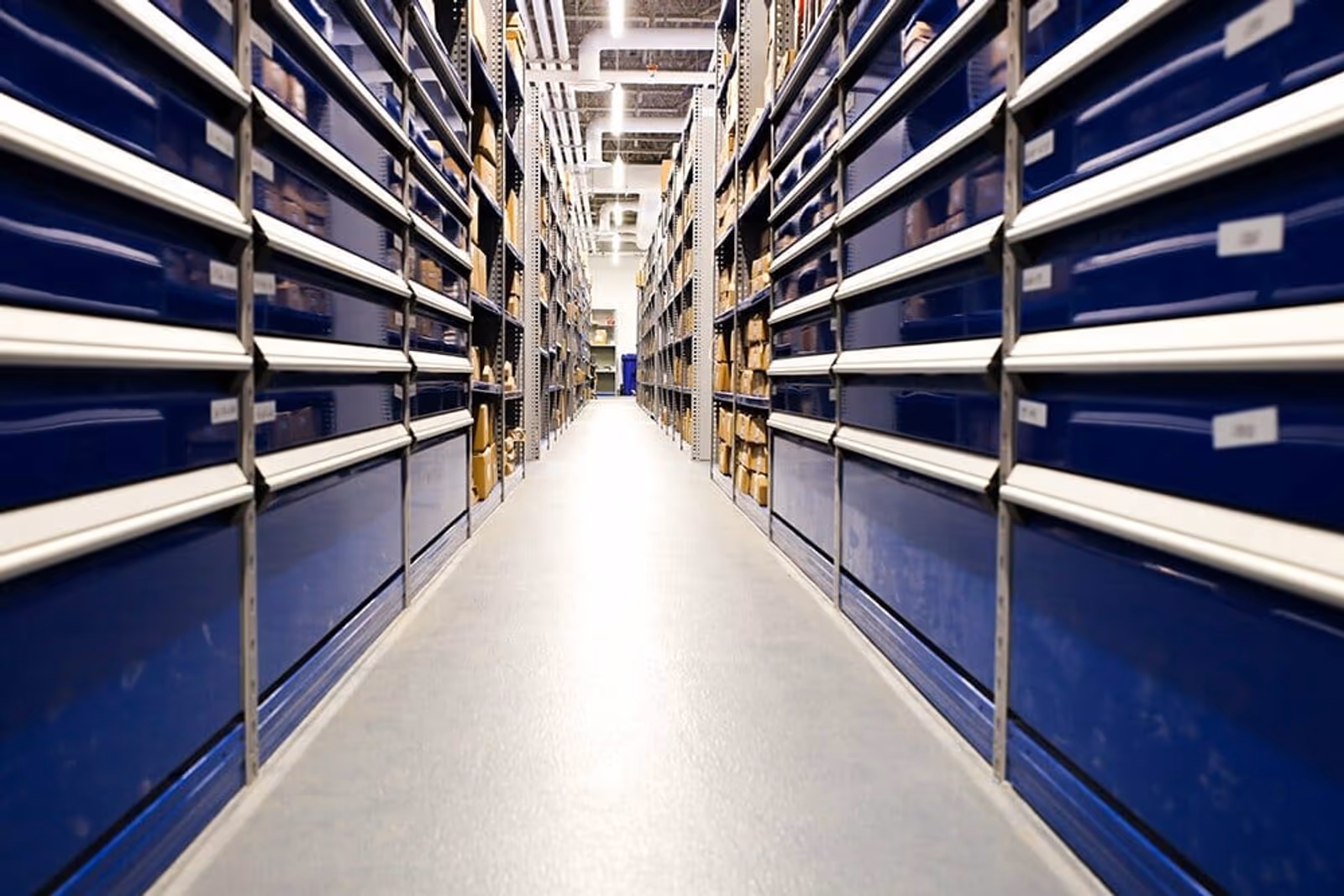 Stocked Ford parts warehouse with shelving of components