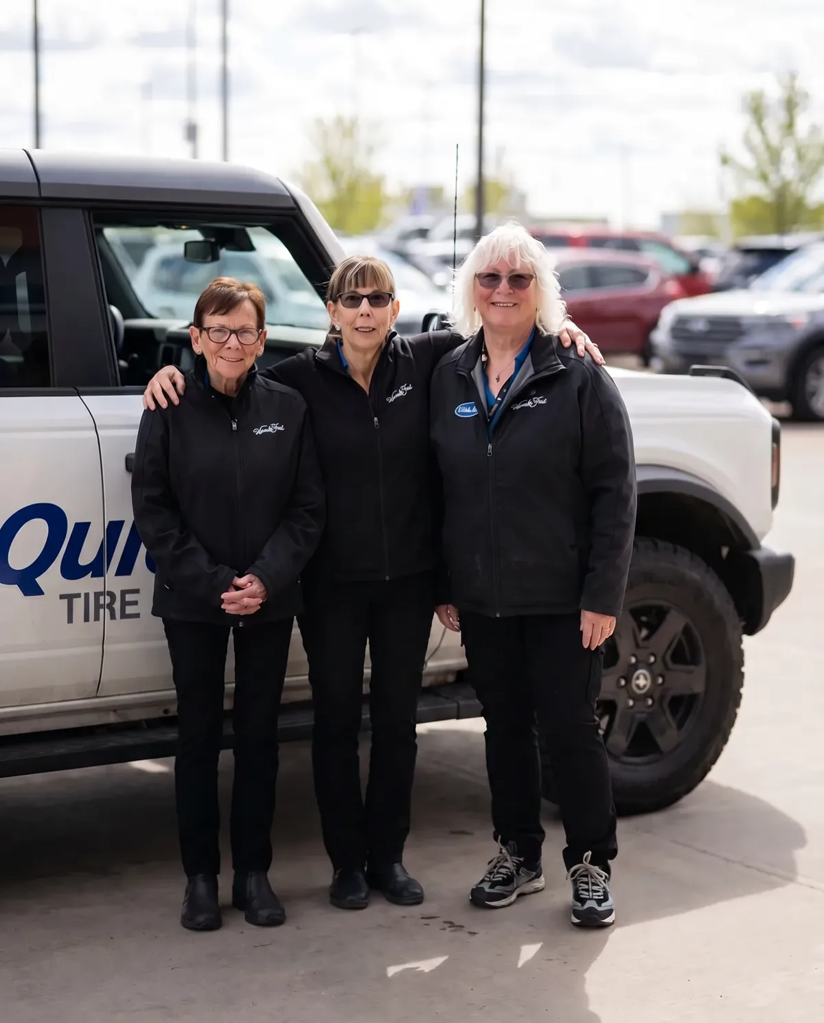 The Windsor Ford service valet and Quick Lane team in front of a Ford Bronco in Grande Prairie